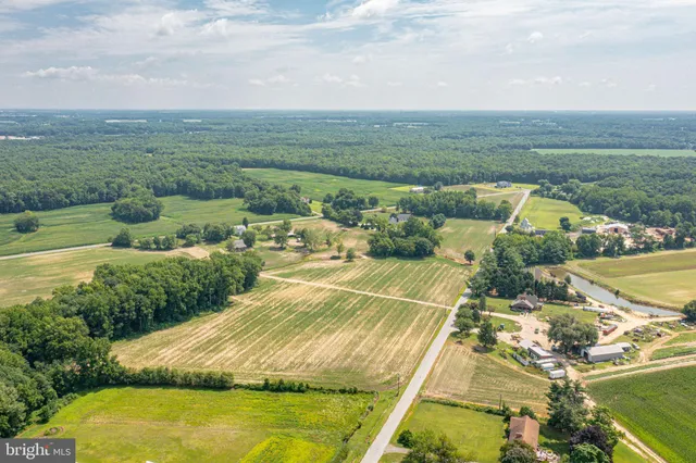a view of a lake with a yard