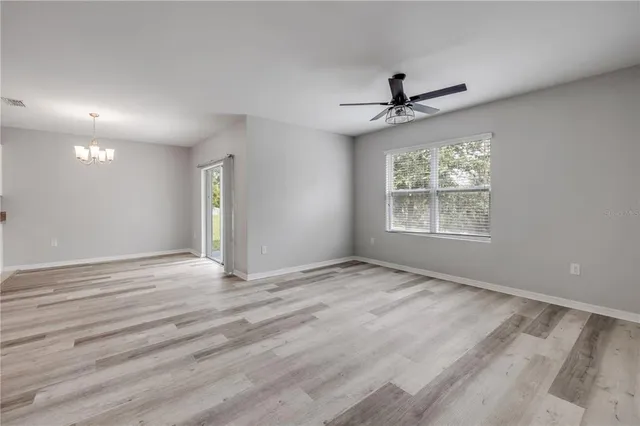 a view of a forest from a window