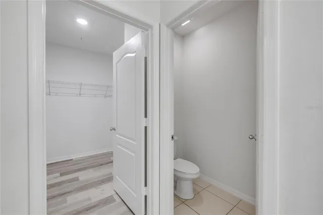 an aerial view of residential house with outdoor space and lake view