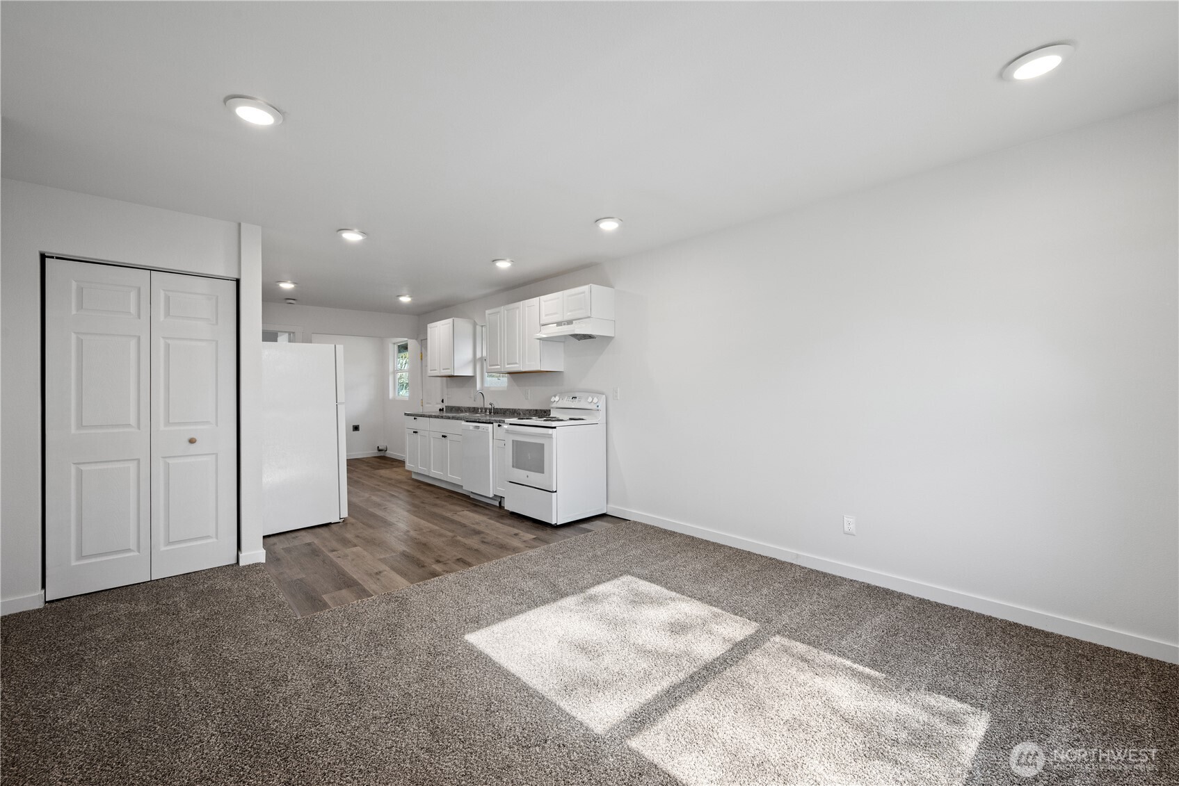 285 20th Avenue Longview, WA 98632 - Photo 13 of 37 a view of kitchen with kitchen island sink and refrigerator
