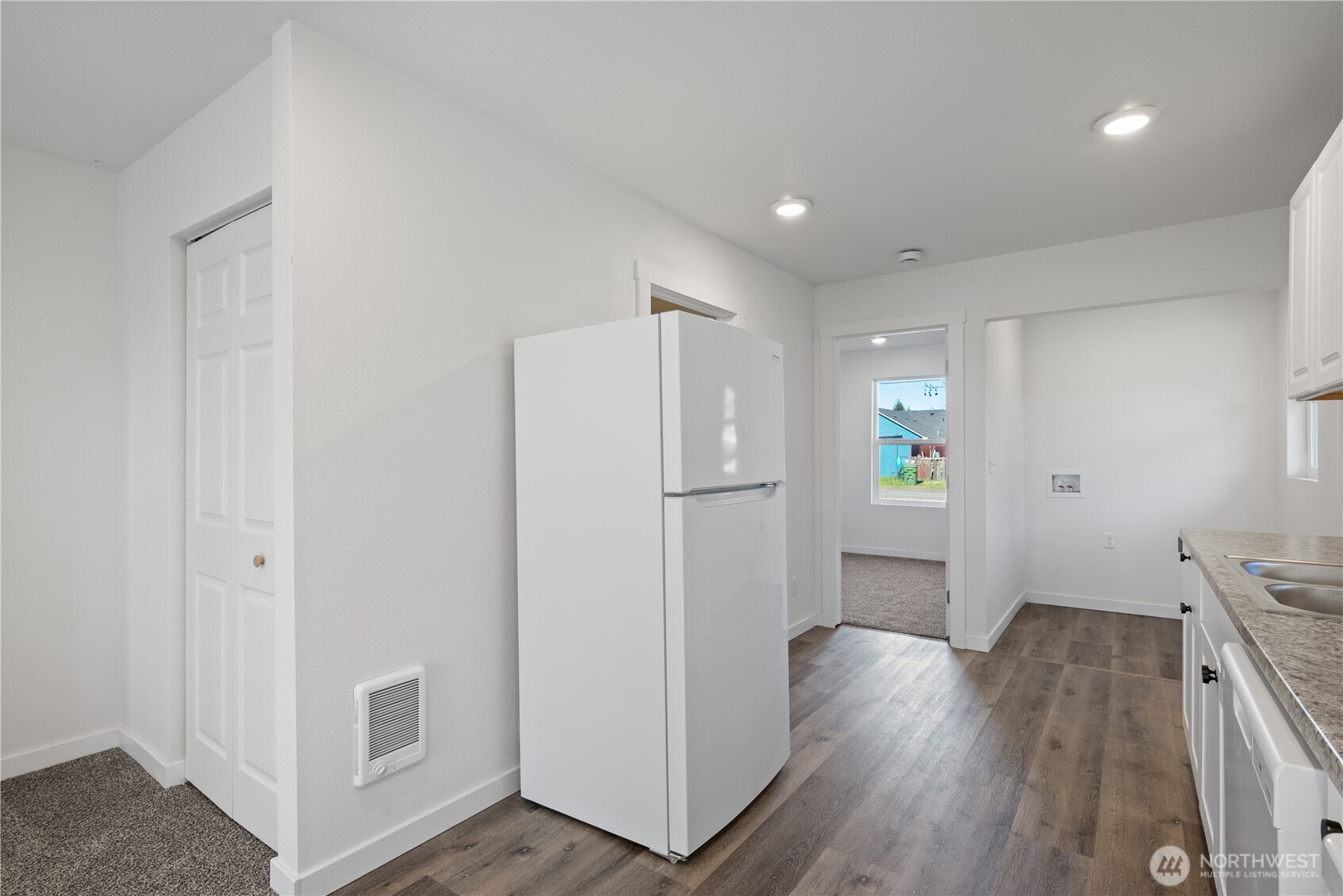 285 20th Avenue Longview, WA 98632 - Photo 17 of 37 a view of livingroom with hardwood floor and hallway