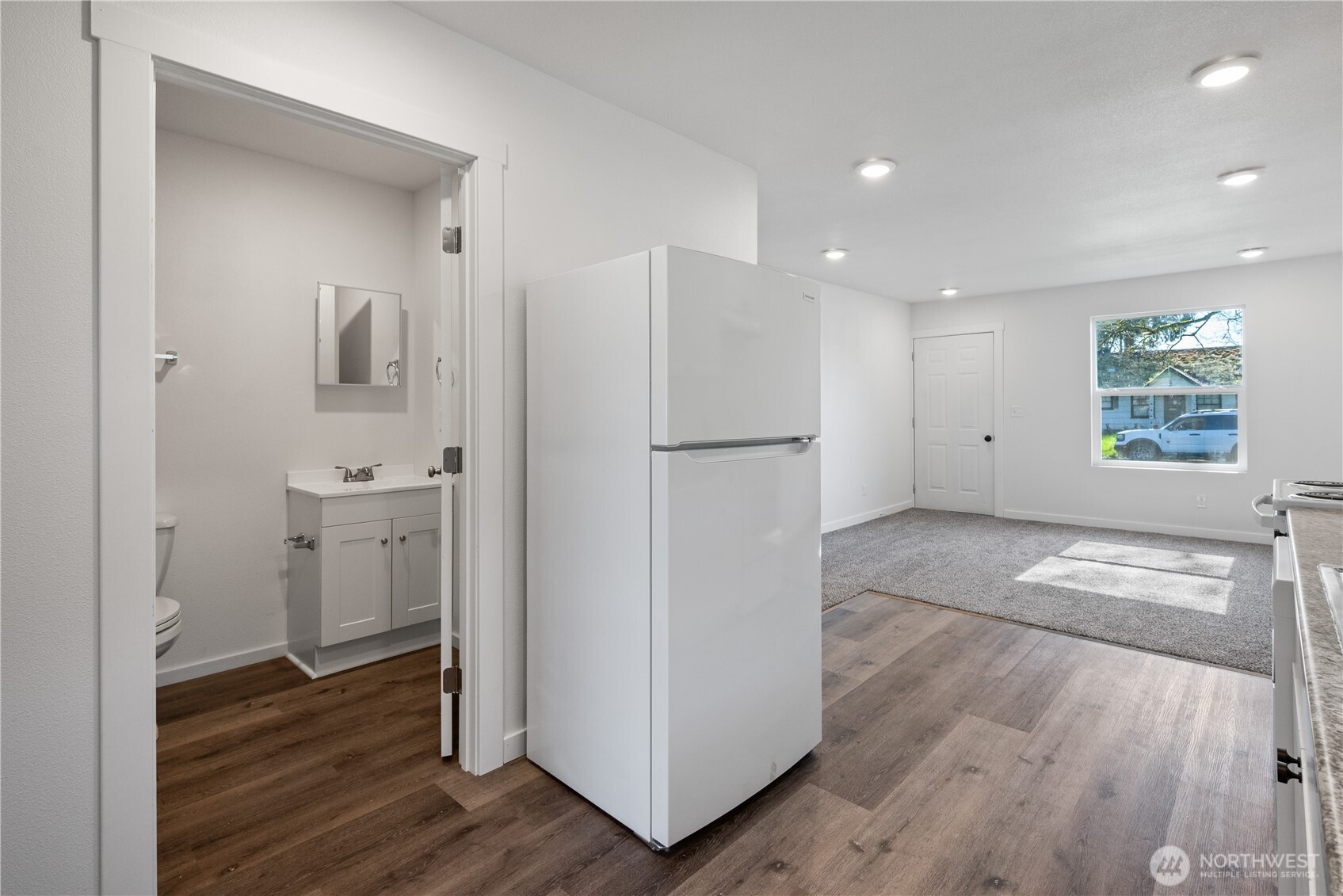 285 20th Avenue Longview, WA 98632 - Photo 26 of 37 a view of hallway with wooden floor and window