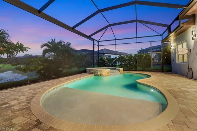 a view of a backyard with a patio
