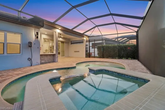 a swimming pool with a outdoor seating