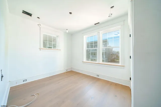 an empty room with windows