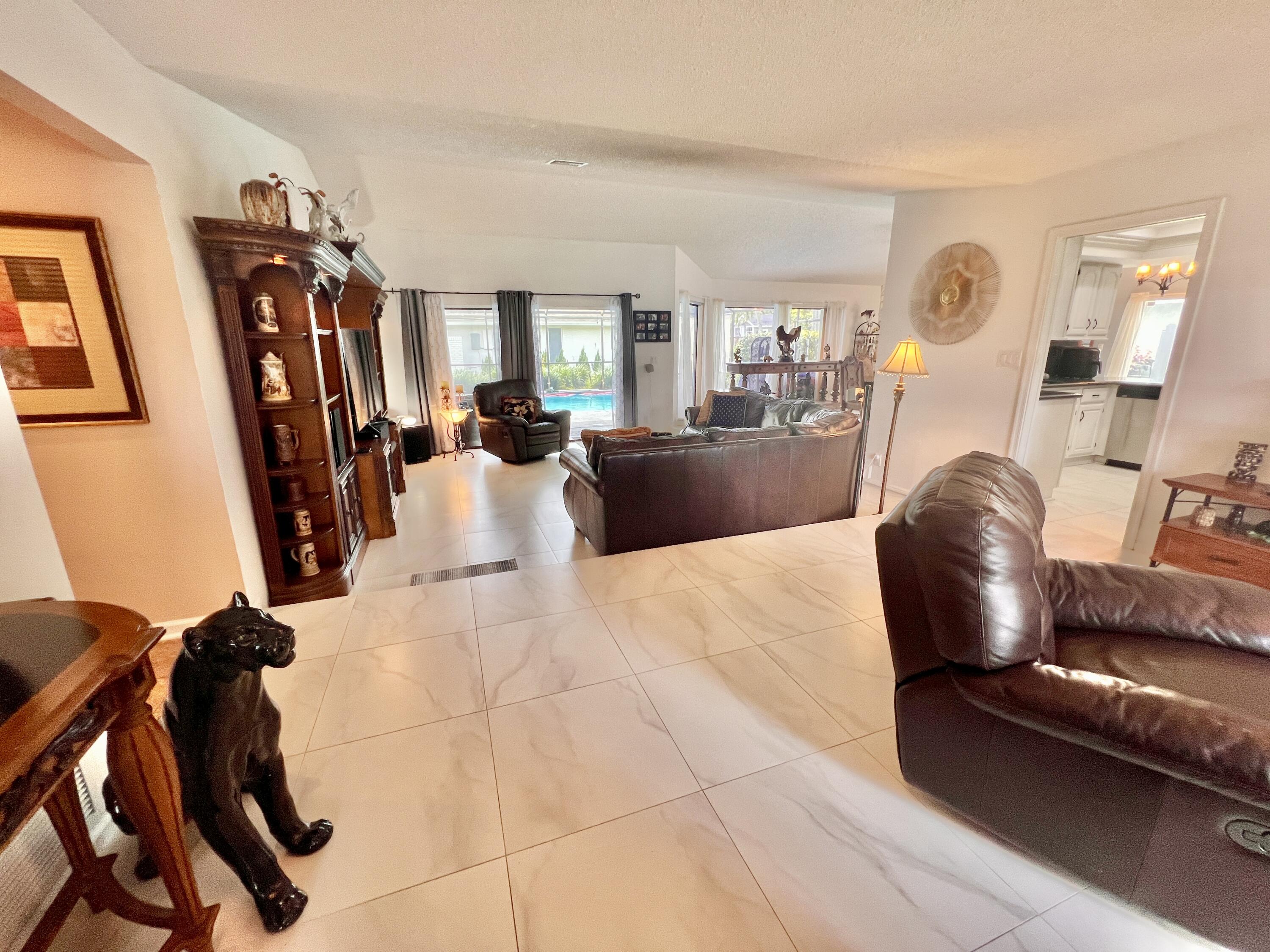 20951 Chisolm Way Boca Raton, FL 33428 - Photo 7 of 52 Welcome to 20951 Chisolm Way
