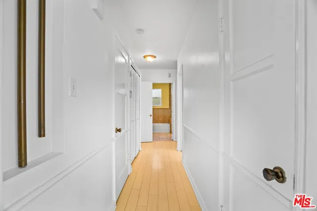 a kitchen that has a sink and a stove