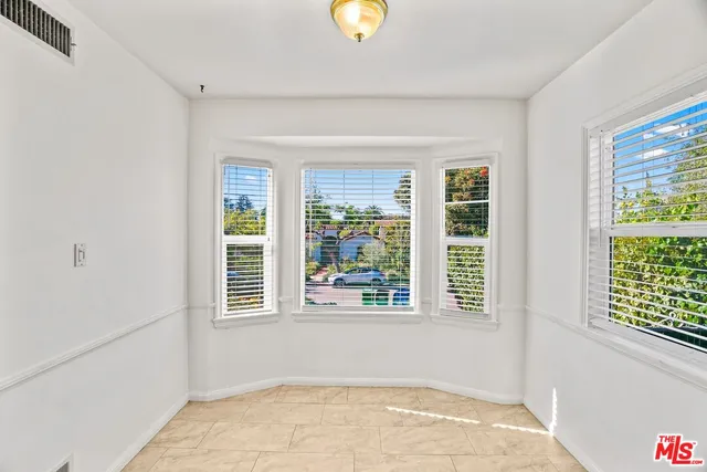 a view of staircase with white walls