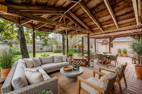 a outdoor living space with furniture and garden view
