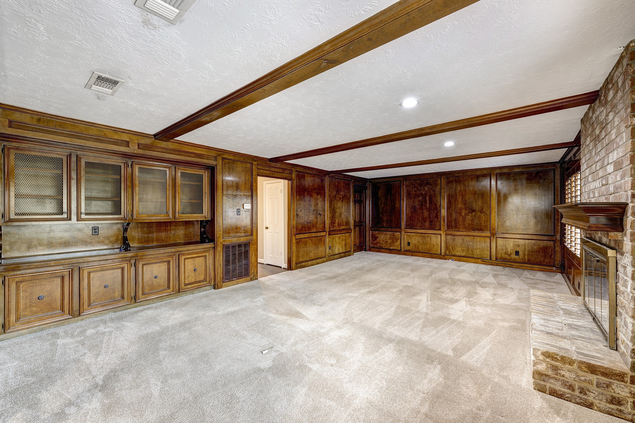 6623 Ampton Drive Spring, TX 77379 - Photo 7 of 26 a large white room with stainless steel appliances kitchen island granite countertop a large window and kitchen view