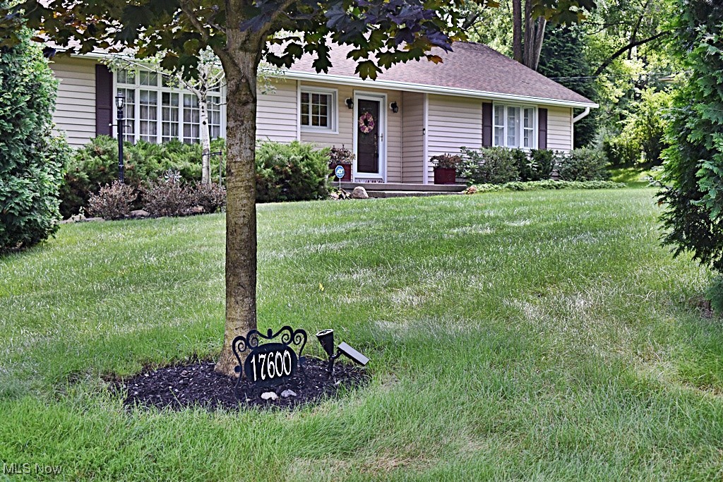 17600 Egbert Road Bedford, OH 44146 - Photo 2 of 49 View of front of house featuring a front lawn