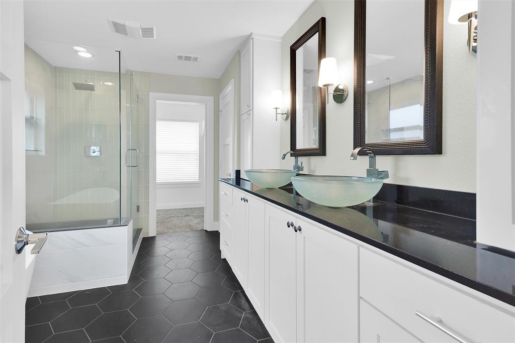 9783 Broken Bow Road Dallas, TX 75238 - Photo 15 of 39 Primary bathroom