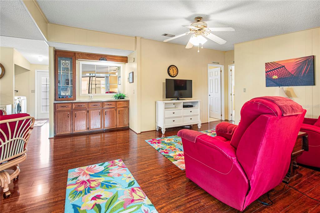 119 Mockingbird Lane Ellenton, FL 34222 - Photo 24 of 51 a living room with furniture and a flat screen tv