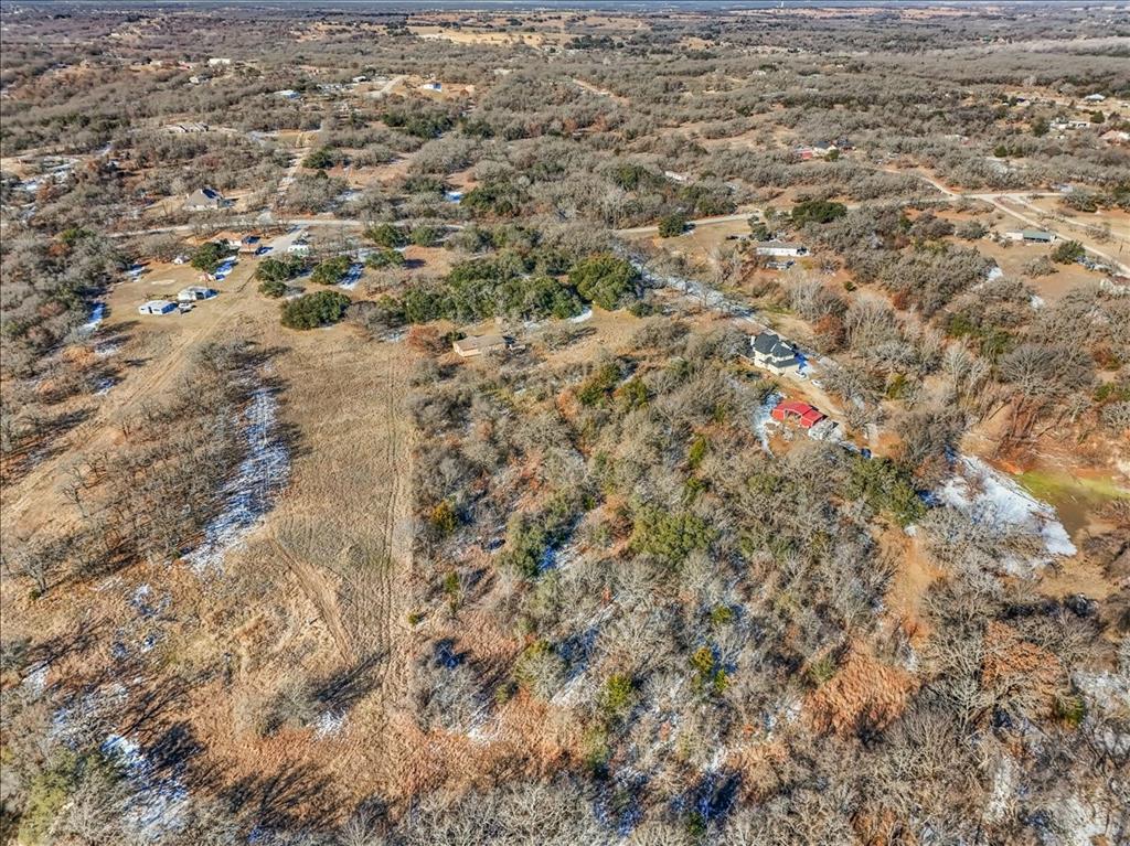 152 Private Road 3647 Springtown, TX 76082 - Photo 11 of 14 a view of a yard with a dry yard