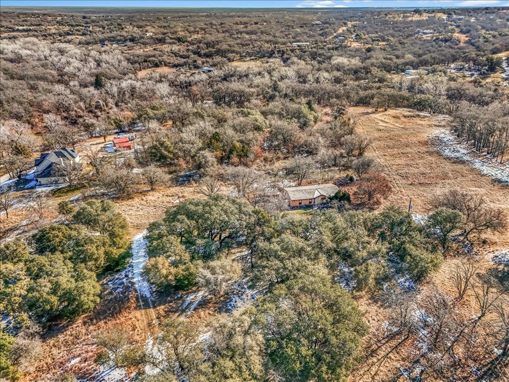 152 Private Road 3647 Springtown, TX 76082 - Photo 7 of 14 an aerial view of residential house with residential space and trees