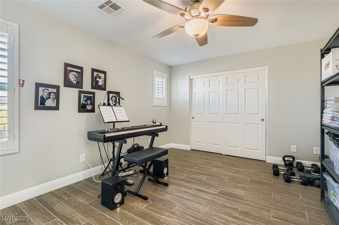 7055 Fort Tule Avenue Las Vegas, NV 89179 - Photo 37 of 75 5th bedroom Tile floors , ceiling fan with light