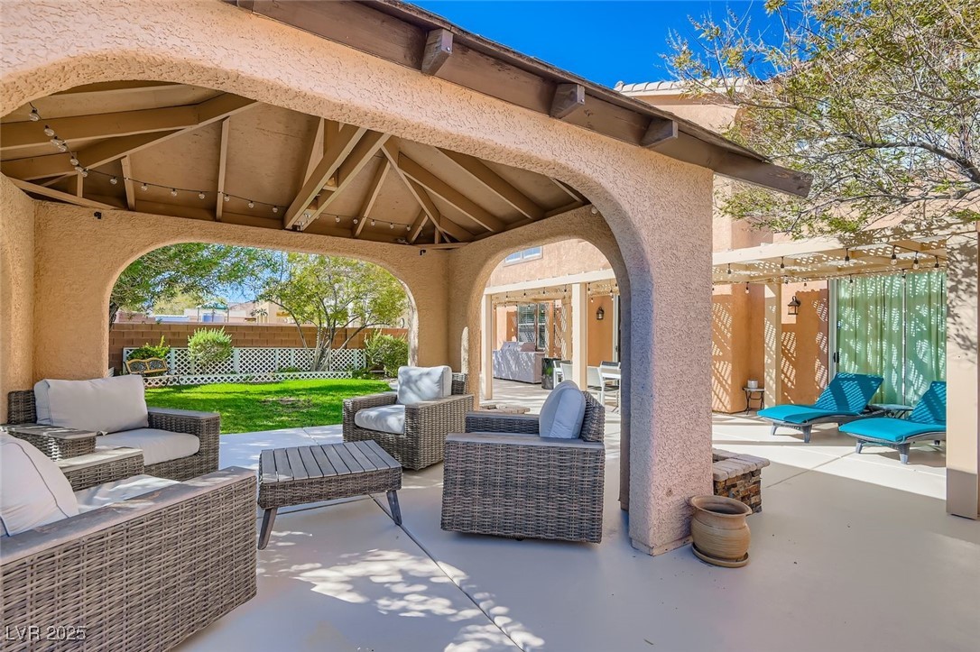 7055 Fort Tule Avenue Las Vegas, NV 89179 - Photo 39 of 75 View of patio with a gazebo and outdoor lounge area