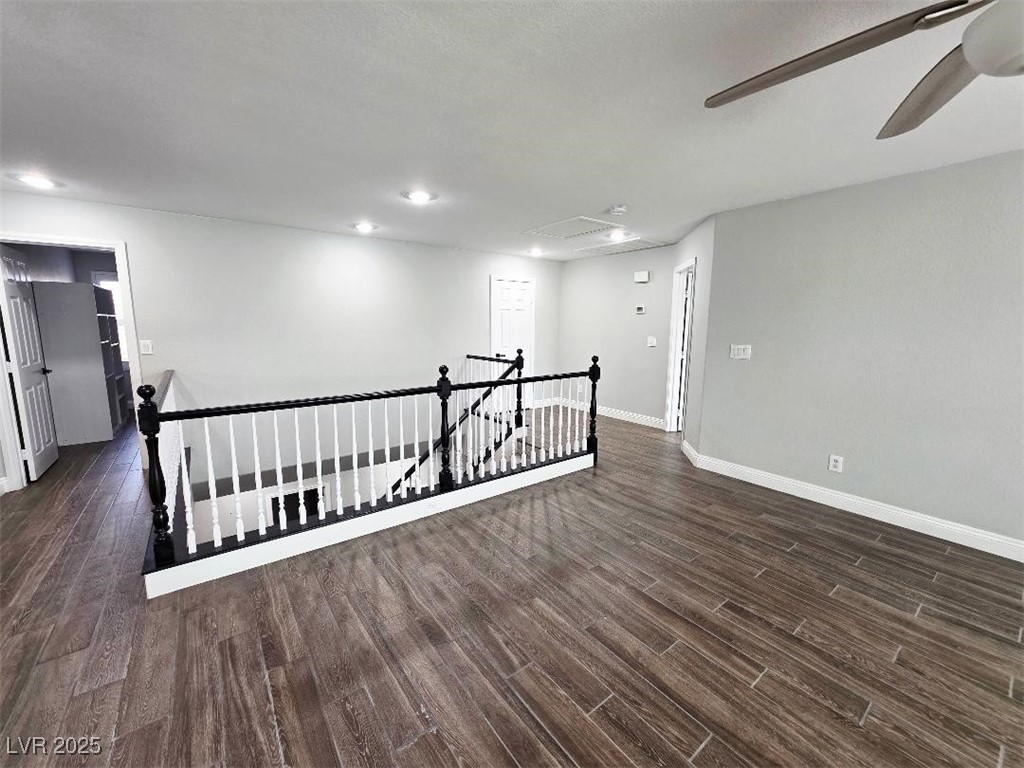 7055 Fort Tule Avenue Las Vegas, NV 89179 - Photo 59 of 75 large room featuring ceiling fan, dark tile-style floors, and recessed lighting