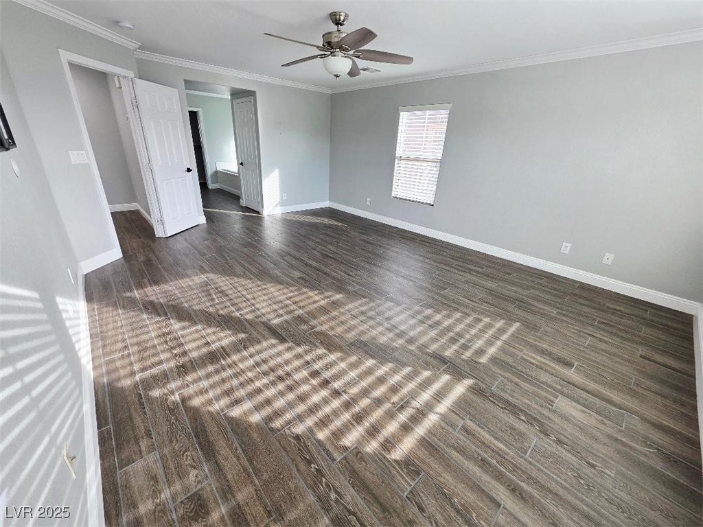 7055 Fort Tule Avenue Las Vegas, NV 89179 - Photo 66 of 75 bedroom with dark tile-style flooring and ornamental molding 2nd floor