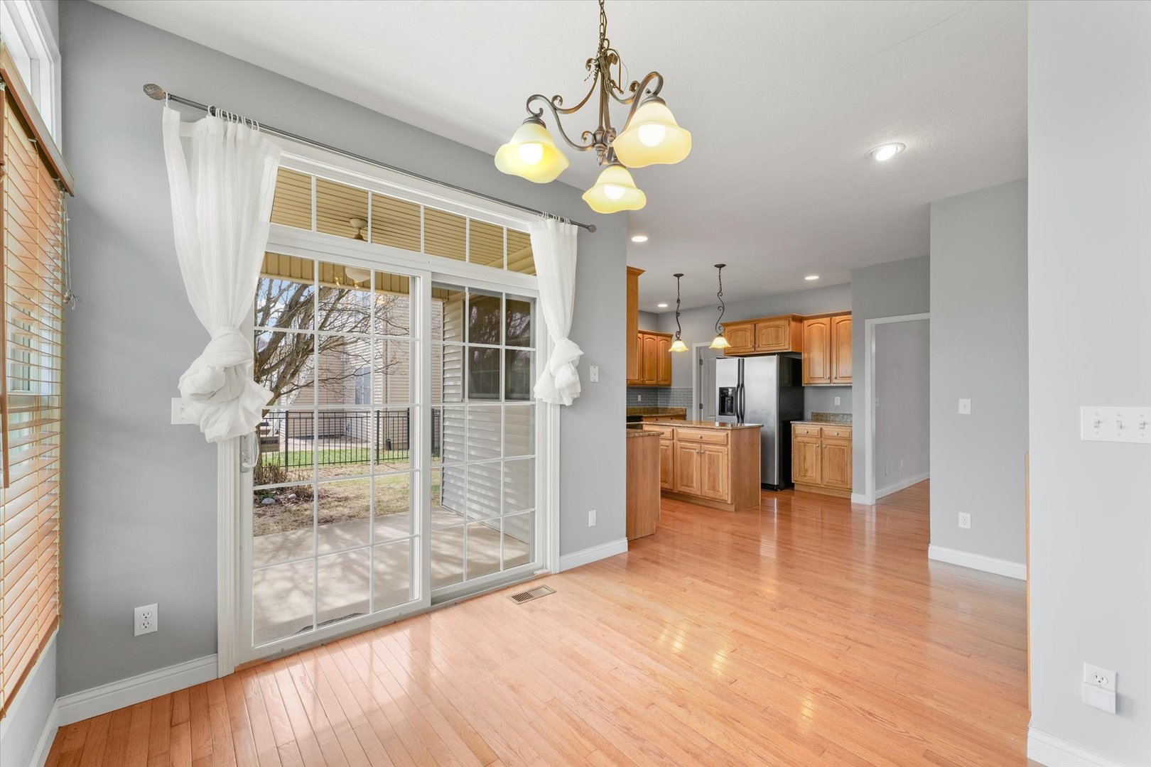 1818 Benodot Street Champaign, IL 61822 - Photo 14 of 41 a view of an entryway with wooden floor and a window