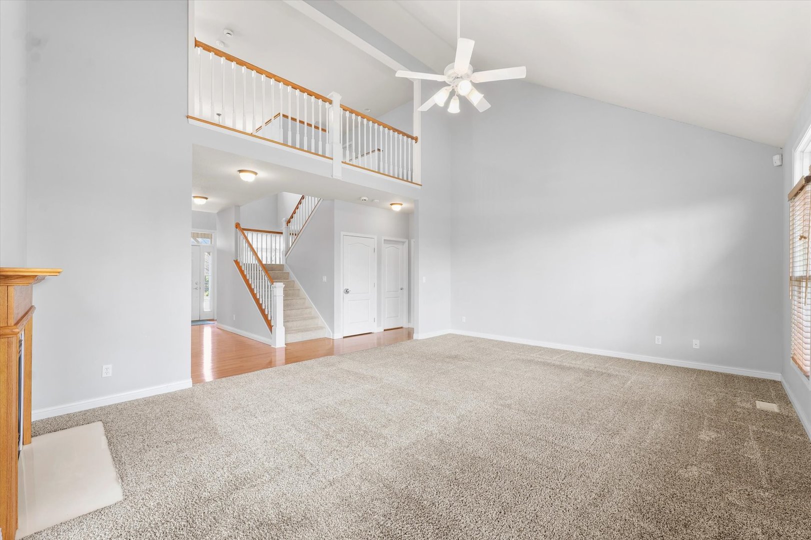 1818 Benodot Street Champaign, IL 61822 - Photo 15 of 41 an empty room with a ceiling fan and window