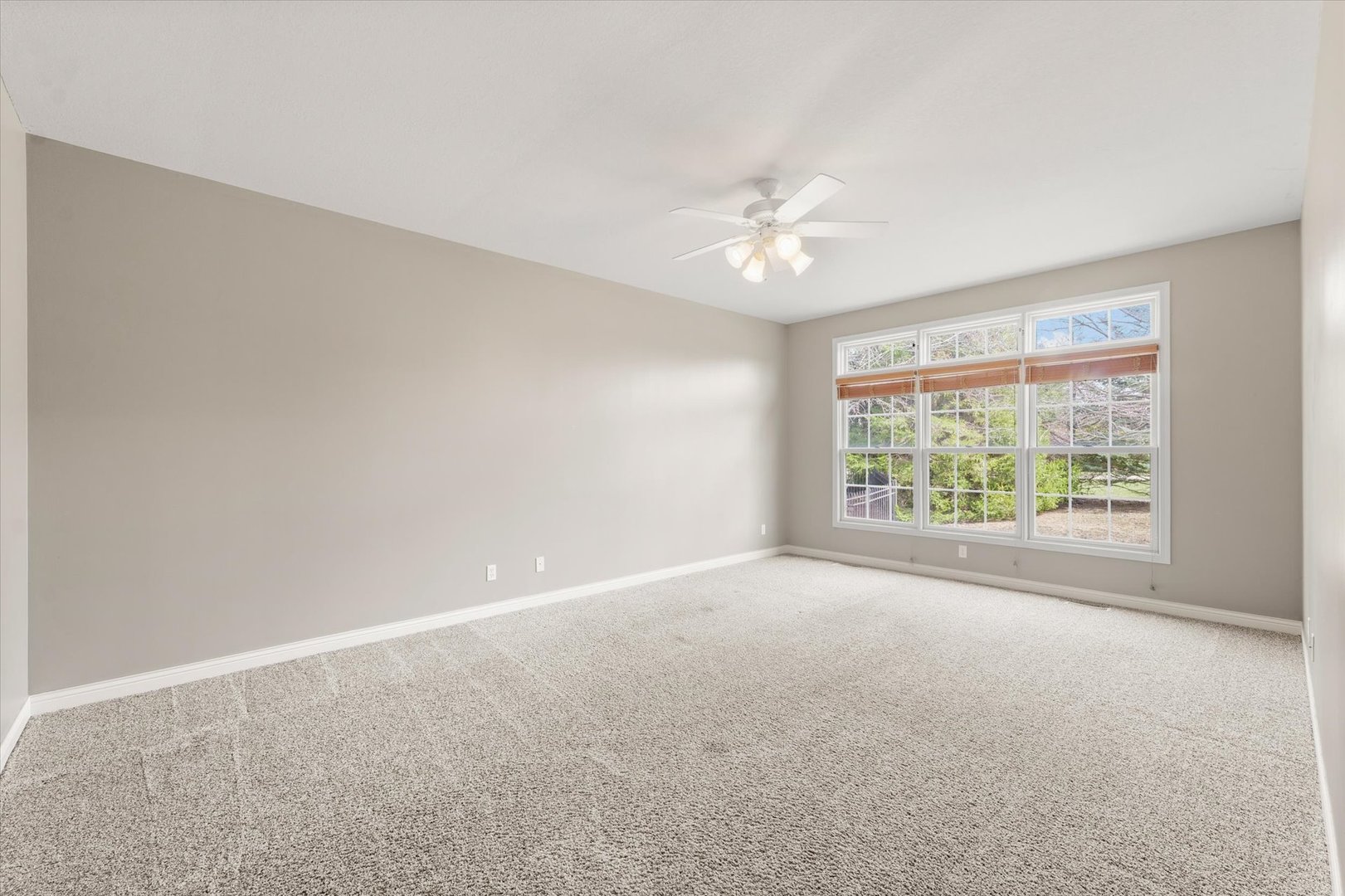 1818 Benodot Street Champaign, IL 61822 - Photo 17 of 41 wooden floor in an empty room with a window