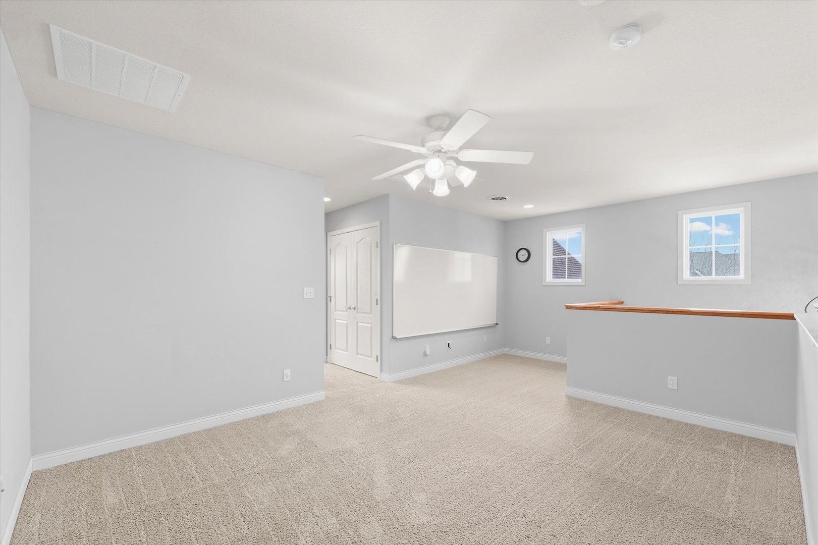 1818 Benodot Street Champaign, IL 61822 - Photo 30 of 41 an empty room with a ceiling fan and window