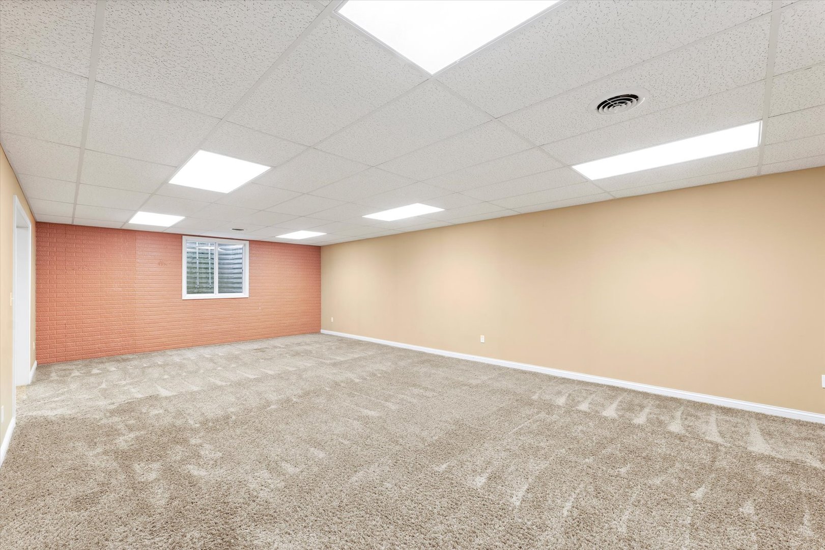 1818 Benodot Street Champaign, IL 61822 - Photo 32 of 41 a view of an empty room with a window