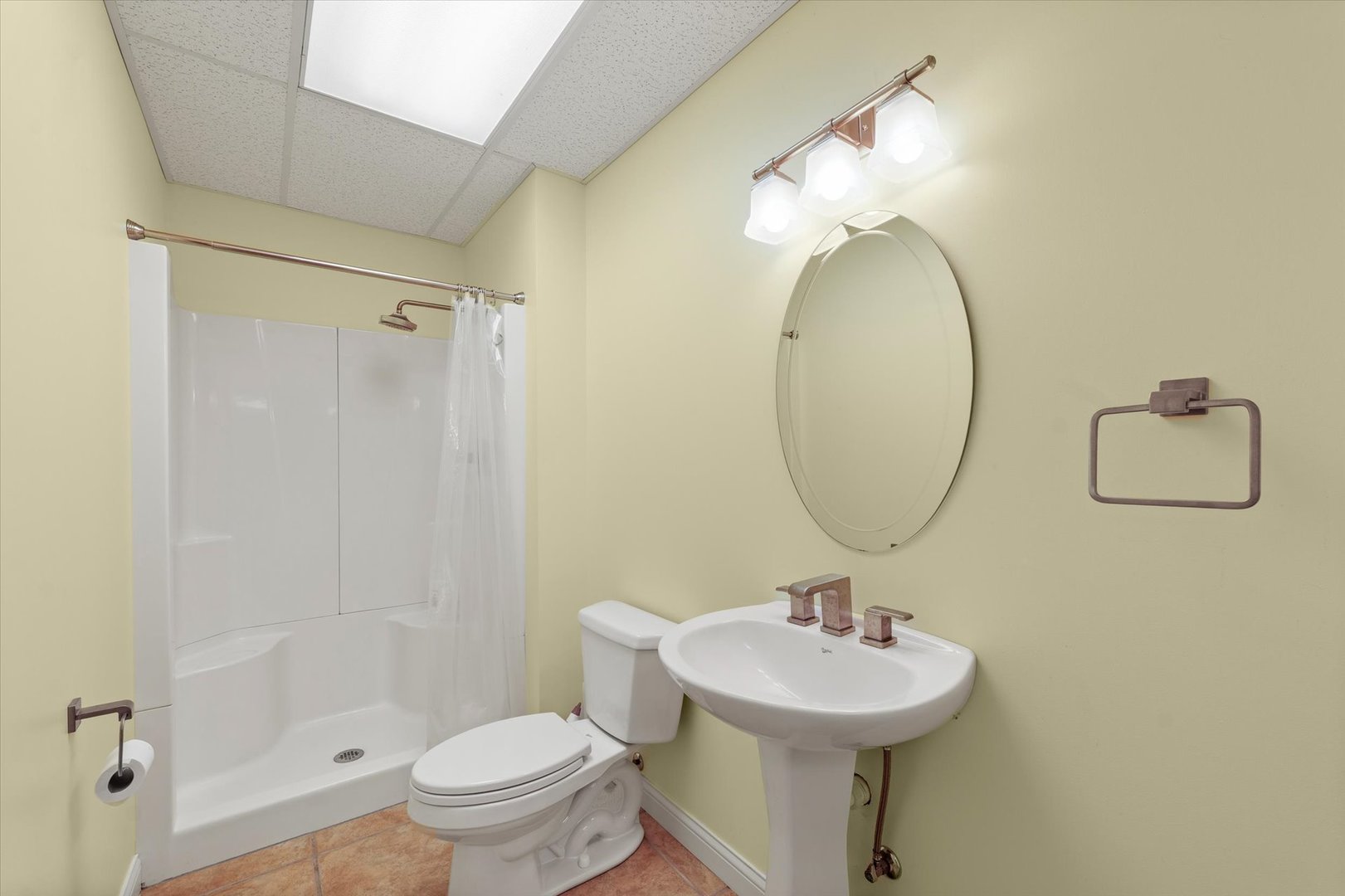 1818 Benodot Street Champaign, IL 61822 - Photo 35 of 41 a bathroom with a sink a toilet and a mirror