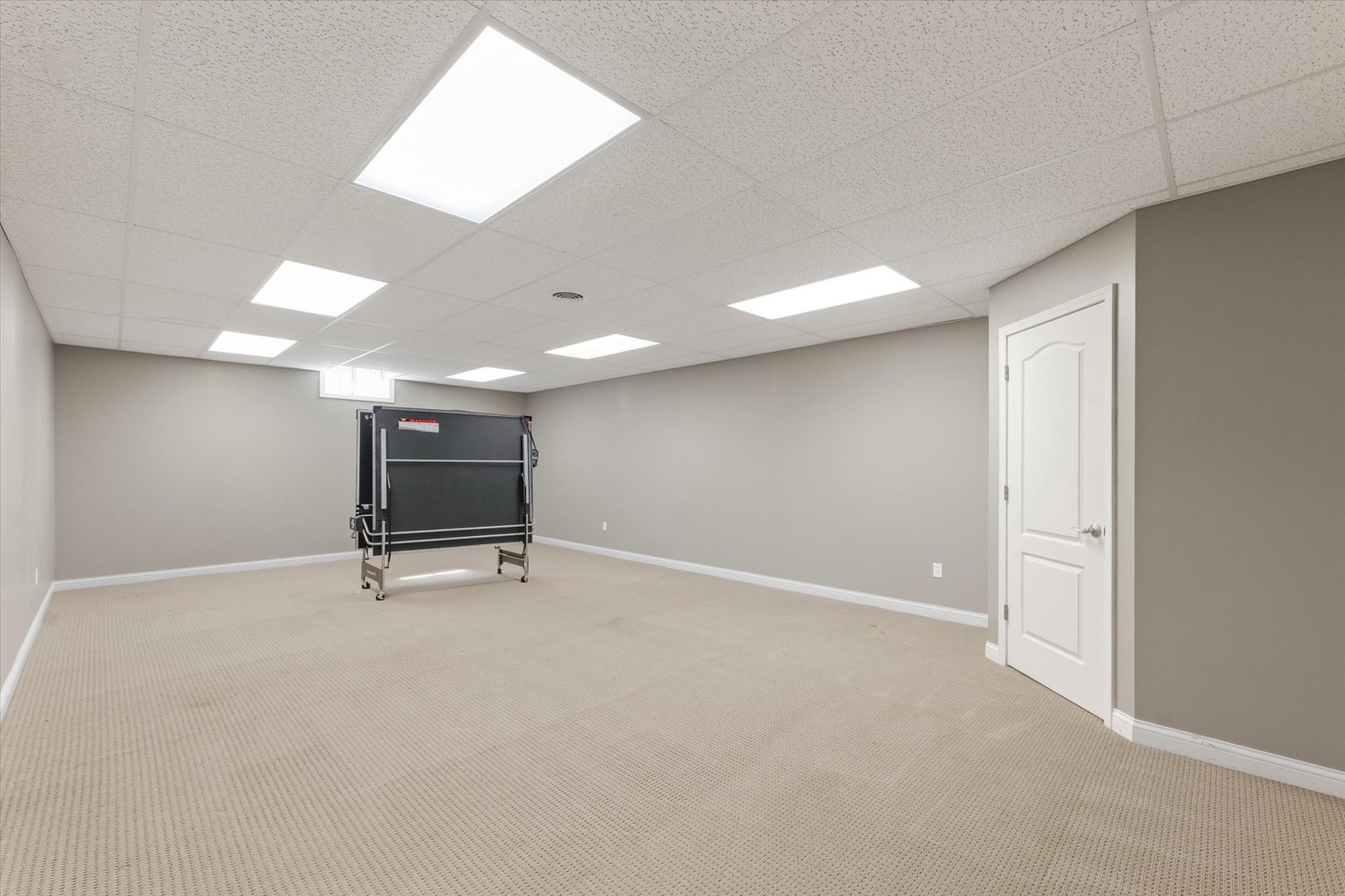 1818 Benodot Street Champaign, IL 61822 - Photo 36 of 41 an empty room with chair and a ceiling fan