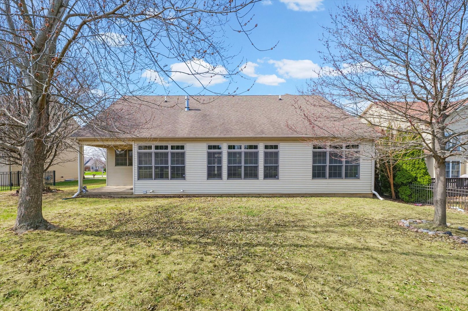 1818 Benodot Street Champaign, IL 61822 - Photo 40 of 41 a view of a house with a yard