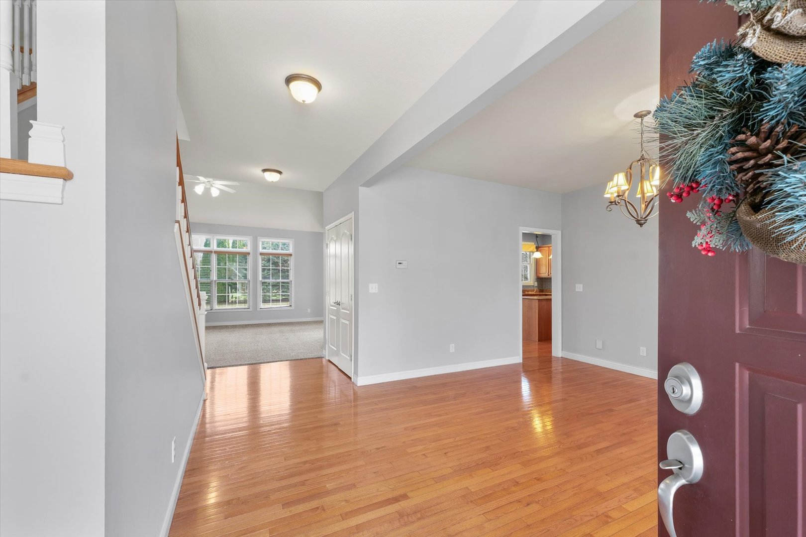 1818 Benodot Street Champaign, IL 61822 - Photo 5 of 41 wooden floor in an empty room with a window