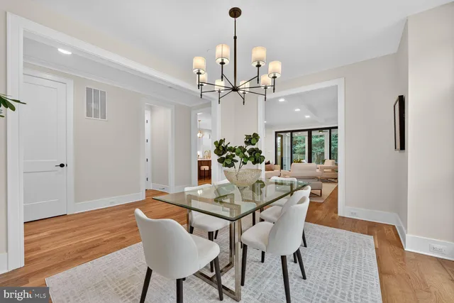 a view of entryway with wooden floor and stairs
