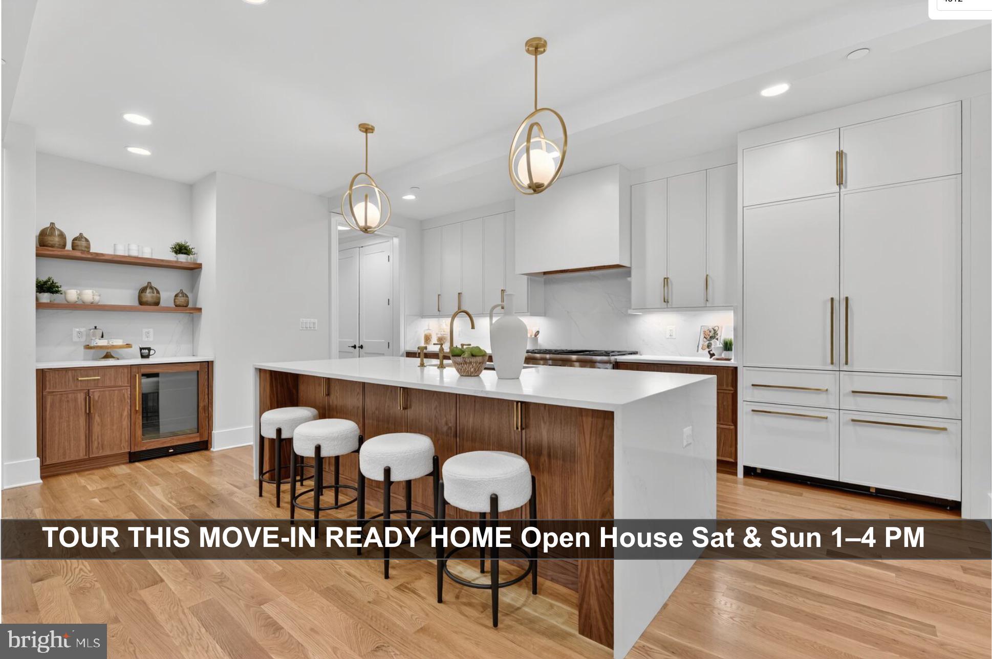 4812 Chevy Chase Boulevard Chevy Chase, MD 20815 - Photo 2 of 32 a view of kitchen and kitchen with stainless steel appliances granite countertop stove top oven