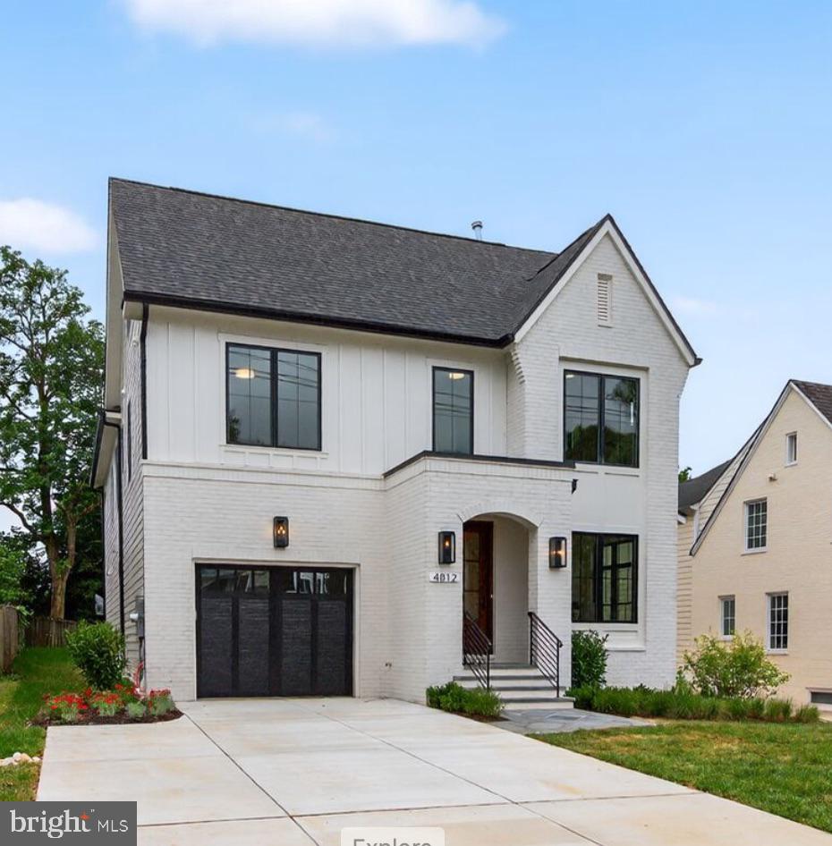 4812 Chevy Chase Boulevard Chevy Chase, MD 20815 - Photo 22 of 32 a front view of a house with yard and parking