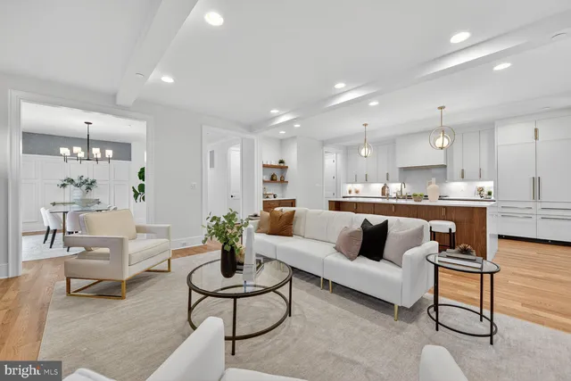 a spacious bedroom with a large bed and a window