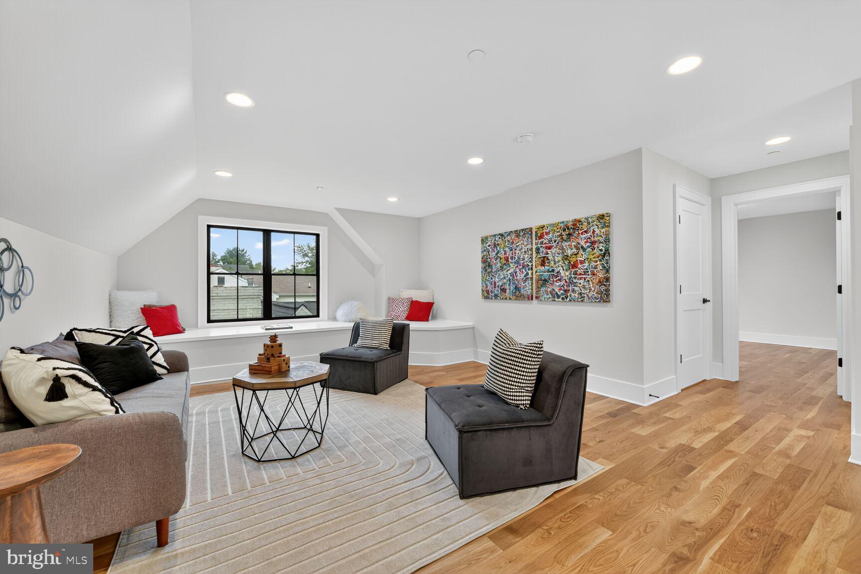 4812 Chevy Chase Boulevard Chevy Chase, MD 20815 - Photo 25 of 32 a living room with furniture and a window