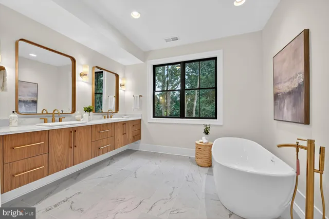 a bathroom with a toilet sink and a bathtub