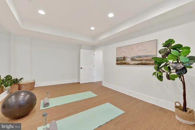 a view of a house with backyard porch and sitting area