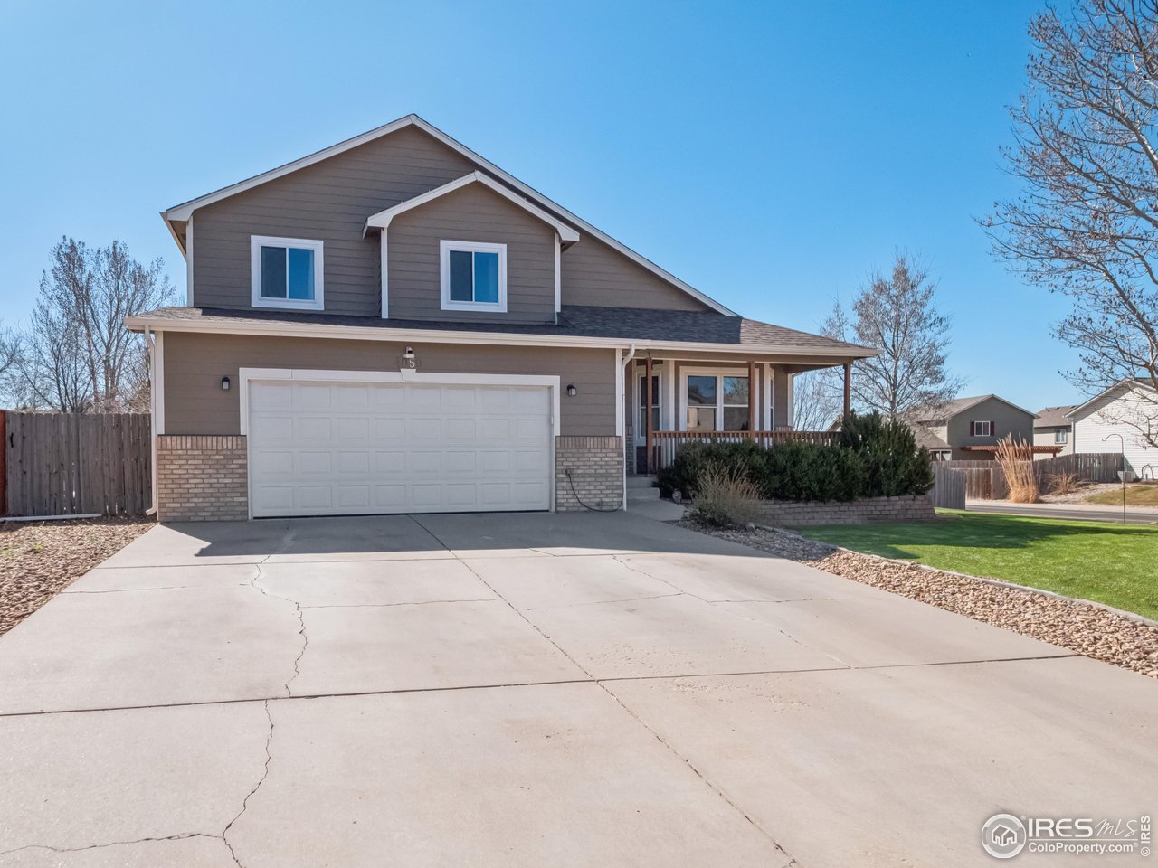 Large .22 acre lot with extended driveway (grass edited for marketing purposes)