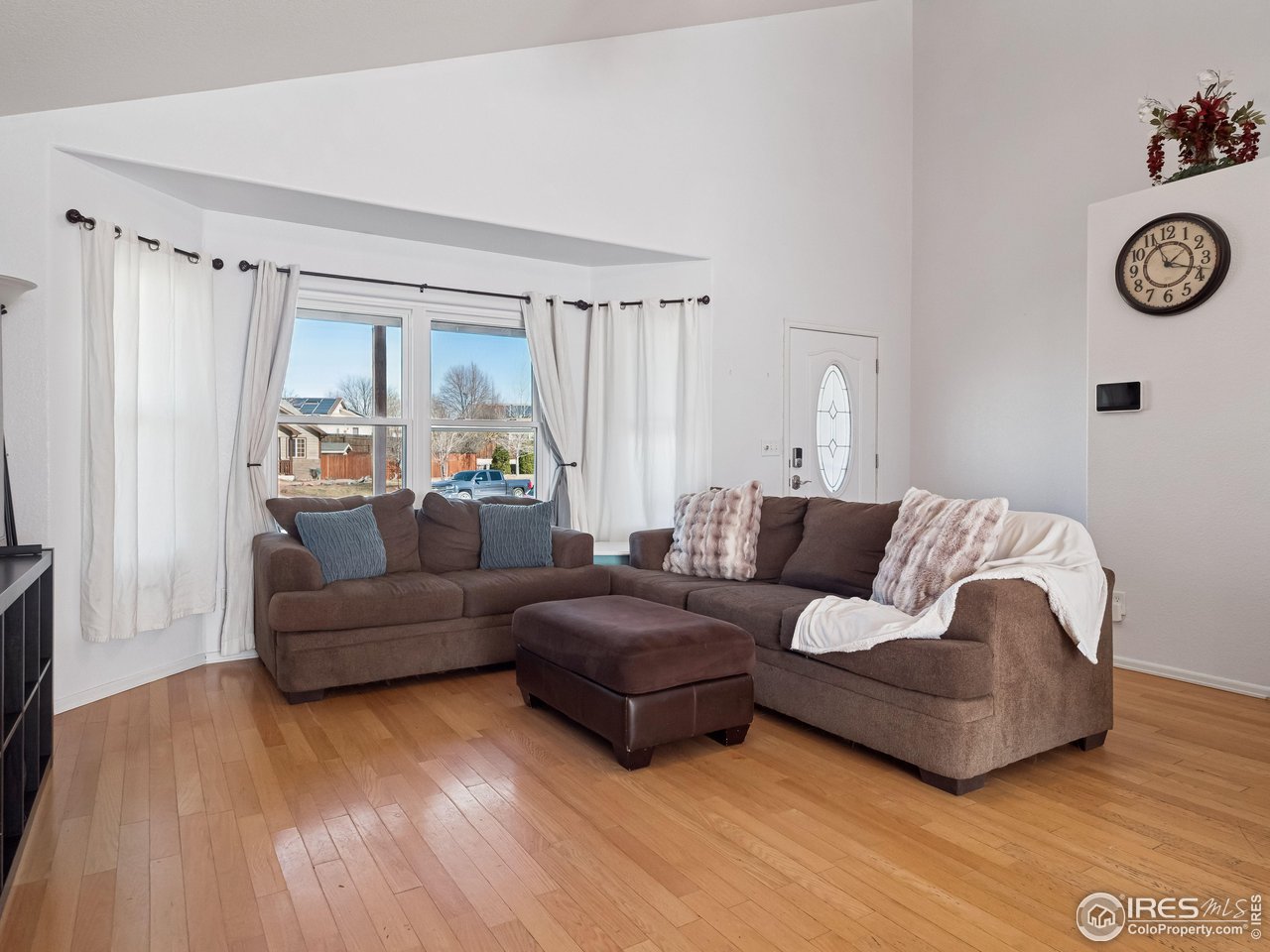 Enter into the living room with hardwood floors