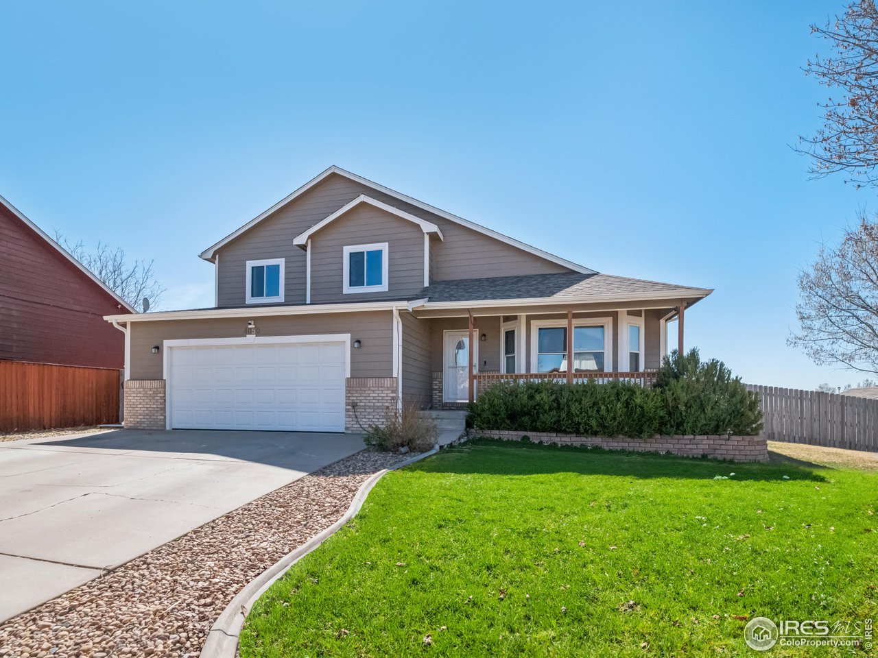 4050 West 30th Street Road Greeley, CO 80634 - Photo 36 of 37 Great curb appeal! (grass edited for season and marketing purposes)
