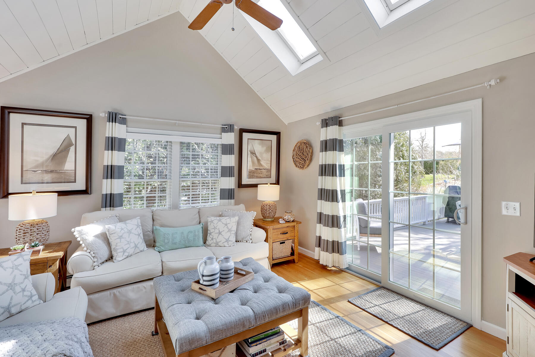 53 Kelley Road West Harwich, MA 02671 - Photo 18 of 43 a living room with furniture and a floor to ceiling window