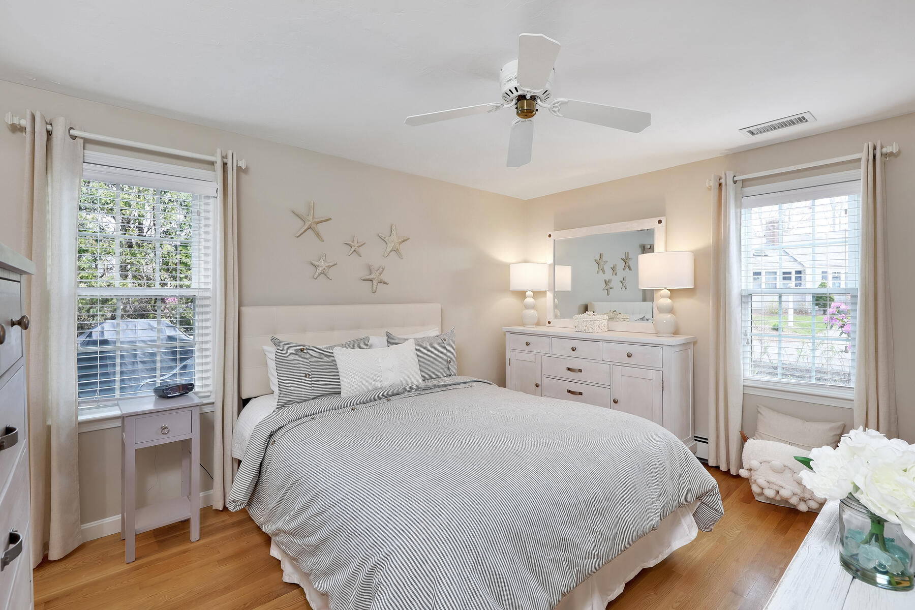 53 Kelley Road West Harwich, MA 02671 - Photo 21 of 43 a spacious bedroom with a bed and a window