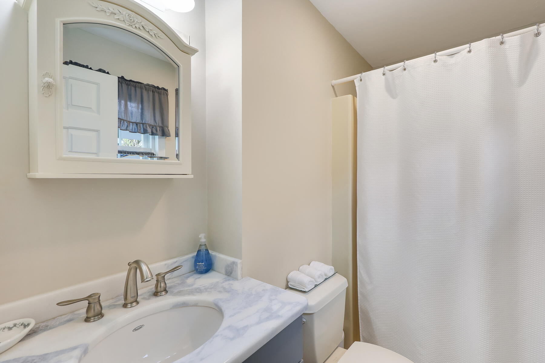 53 Kelley Road West Harwich, MA 02671 - Photo 23 of 43 a bathroom with a granite countertop sink and a mirror