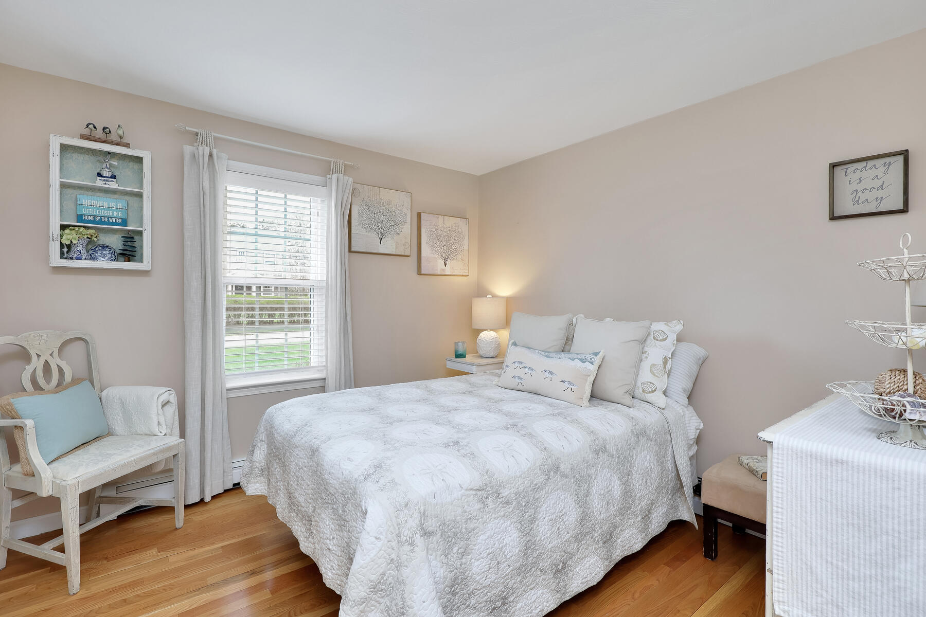 53 Kelley Road West Harwich, MA 02671 - Photo 26 of 43 a bedroom with a bed and wooden floor