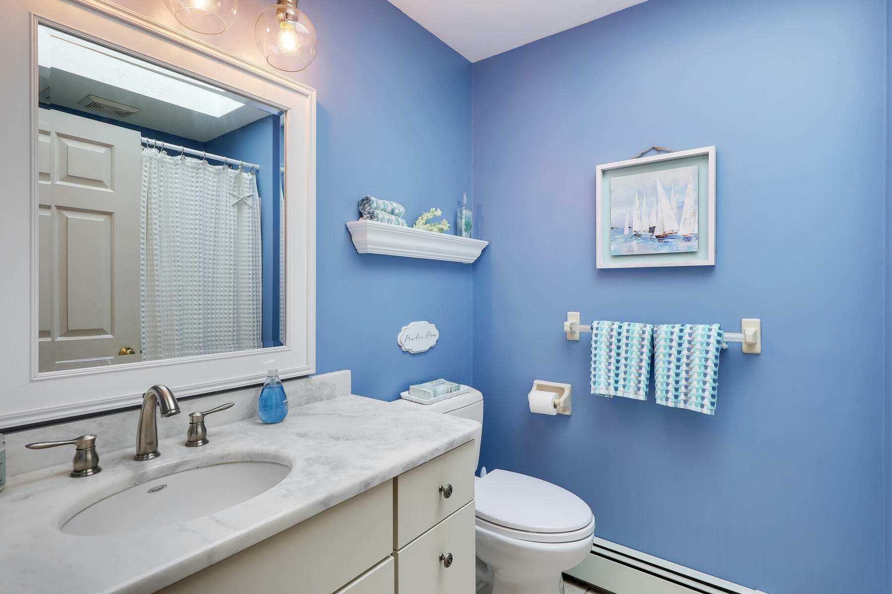 53 Kelley Road West Harwich, MA 02671 - Photo 27 of 43 a bathroom with a granite countertop toilet sink and mirror