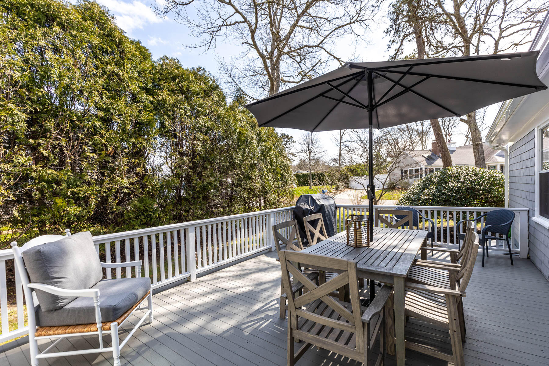 53 Kelley Road West Harwich, MA 02671 - Photo 32 of 43 a view of balcony with furniture and umbrella