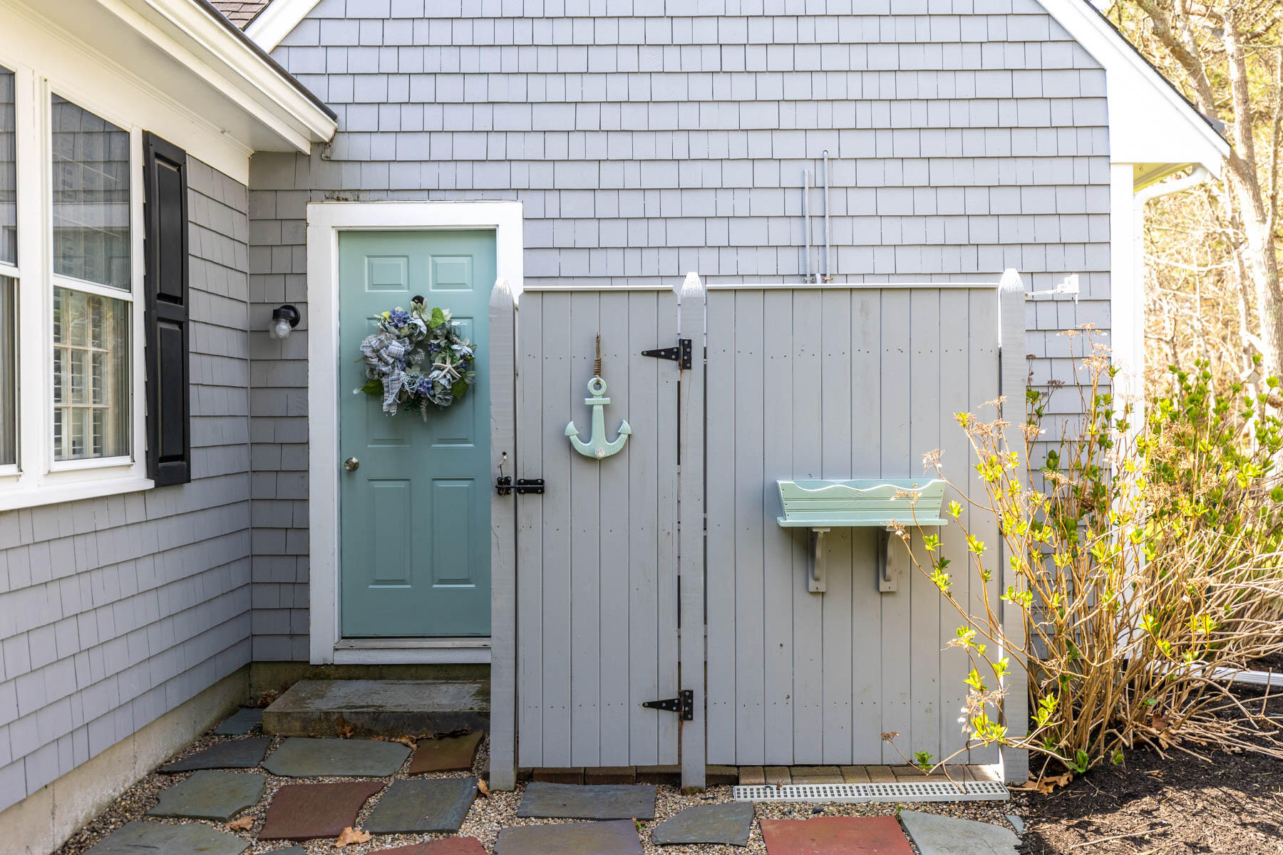 53 Kelley Road West Harwich, MA 02671 - Photo 33 of 43 a front view of a house with a glass door