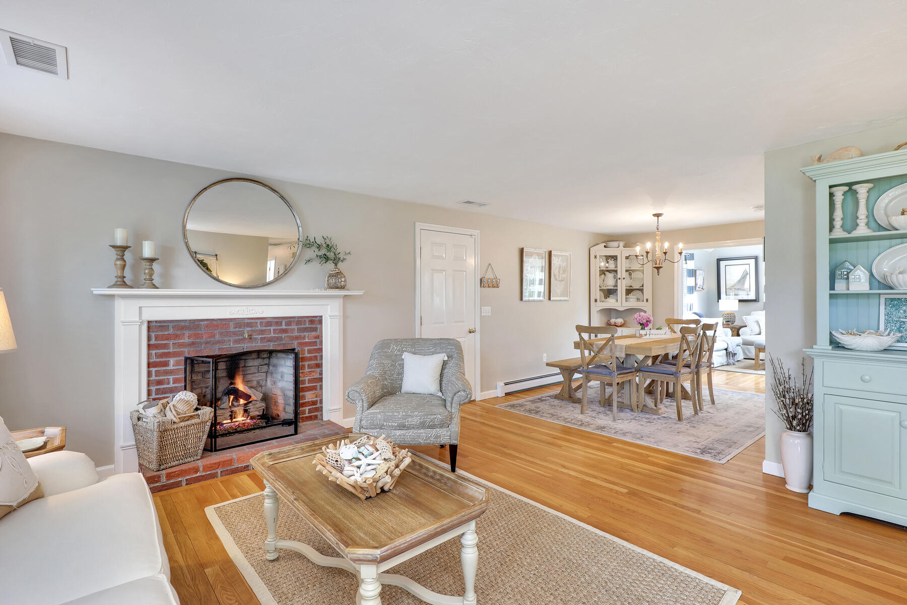 53 Kelley Road West Harwich, MA 02671 - Photo 5 of 43 a living room with furniture and a fireplace